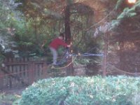 IMAG0869  Climbing around on that hammock he made.