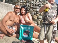 IMGP4840  Sam worked on that volcano for 90 min maybe? An hour for sure. Ben enjoyed entertaining Nick and Sabrina, new friends we met on the beach. Can you see what is on their bag????? OMG! So fun to talk island with them. They like to visit Hawaii.