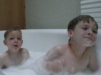 IMGP4847  Naughty Ben sent bubbles all over the bathroom floor, so he got to clean up while Sam soaked.