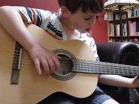 IMGP4858  Taking guitar lessons now. Learning to read music - notes on scale and guitar tab. Right now learning "Two of Us" (Beatles).