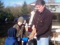 IMAG1057  This is Jim Trainer showing the boys all sorts of very intersting forest-related facts. This is a cougar paw. We are out at a tree planting.