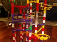 marble run  The marble runs are intricate. Sam builds them from pictures on the box. Sometimes he can detect when they're just slightly off and gets very upset. I told him that grown-ups have a very hard time stepping back from their work and being critical, so that is a very good skill. The key is to not get so upset that you can't discern what the problem is. He should be very proud that he can detect flaws, because that is the first step in mastery.