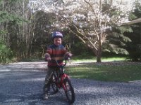 IMAG1623  Ben careens up and down the driveway - he loves getting up some serious speed on the downhill!