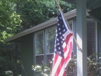 IMAG1733  Half mast for Memorial Day. You're supposed to do that until noon, then raise it again.
