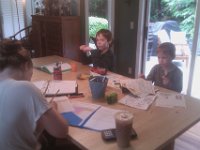 IMAG1786  Tutoring time. I tutor three times a week. With two boys home, it's more like the frontier school I have been dreaming of. It's been a very busy week. I also worked 19 hours on a project for an MD/MPH/PhD in Kazakhstan. Plus tutoring, and playing with boys, and swimming lessons, and chicken tending...and being sick.
