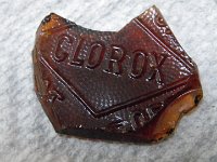 IMGP6879  We went on a hike which ended at the beach and found these neat treasures, including this part of an old (1930s?) Clorox bleach bottle. The Clorox bottles apparently have very unique markings which allow them to be dated pretty accurately. The CA FIRE dept forensics team uses them to help date buildings.