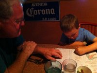 tic tac toe  Out to dinner after a long day shoveling and transplanting and trenching a hose...