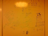 IMG 20121015 090003  More math stretching! This time I had each of the kids write about what "Decimal Dino" ate for dinner ove the weekend. Decimal Dino is a Pez dispenser I make "talk" at the opening of class each time. Kids have a hard time with fractions/decimals/percents so the teacher on special assignment here suggested I work with them in this area in addition to the other problem solving exercises we do. So we develop facility with proportions each week using conversation about what they eat (pizza is a common weekend food, and very easy to talk fractions with!).