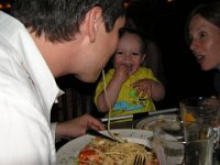 6-16-2006OliCameraNE 162 (4)  And some funny pictures of Sam stealing spaghetti from Tito Pig in NYC whne he was about 17 months old. This is a month before we moved to Hawaii. I don't quite remember what brought me to NYC around Father's Day, but I do remember being there. Probably to see family before we moved?