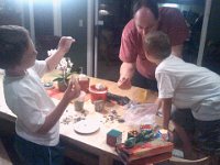 Pic-08152013-049  Showing Daddy all the loot from the Rock Ranch! Welcome home, guys! I love you!
