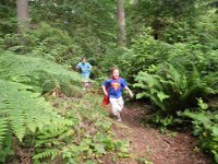 IMGP9430  Running through our trails with glow sticks and capes on :)
