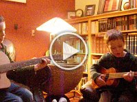 IMGP0208  We were thinking about how Sam played ukulele when he was five. He really had a progression and strumming pattern down. Maybe if we're lucky the boys will put on a Christmas concert for us :)