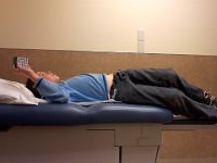 Pic-10032013-001  We have spent much of Oct. sick. Here is Sam's visit to Dr. Brown. He is on the same changing table he was placed on as an infant to be measured. He has really grown. Like how he is relaxing with his cube while waiting for throat culture results?