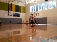 Pic-09102013-002  Hoops after school with Coach Henry! This is the gym at the boys' school - it is brand new, only a year old.