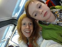 Seattle PSC 027  On the monorail heading back to the ferry. Boys are just being silly - he looks mad but isn't :) : Seattle PSC