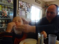 DSC00834  Dave trying to clean Ben. Look at how he has to hold onto that head!
