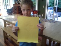 20140607 161054  Ben spilled water on the kitchen floor and went to get a piece of paper to draw us a caution sign! He even folded it so it would stand up!
