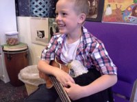 20140612 184404  At guitar/uke lesson last Thursday. Ben is so cute - sometimes bringing Grownup Eagle to things still. I hope we get to keep bringing Grownup Eagle around. I will miss him when he doesn't come along.