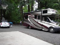 20140617 163812  This is the RV backing in. I took this picture because I thought Richard might like to see his big rig pulling into his cool spot with hookups. Then I noticed Mom in the background, directing him. But...I am unclear on the signals. Are you? It looks vaguely Gangnam style.