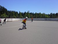 20140709 142324  Sam at roller hockey camp doing drills.
