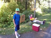 20140710 142141  Selling eggs for the team! Ben was a superb sign spinner - so funny! People weren't stopping until he got out there. He even helped color in the signs.