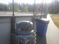 20140712 084610  And this is the next day at the rink for a Saturday morning game. It is hot out already. I guess a few sticks didn't make it!