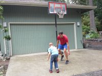 20140724 125109  Basketball with Campbell. Ben and Sam really have some great moves! I can't believe Ben can send the basketball between his legs!