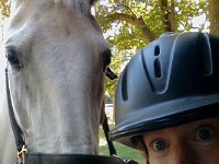 20140904 124303  Do I look nuts or what? The horse (Emmy) seems fairly normal here. I had a great ride that day. Avoided being bucked off during a canter depart. I always feel like a million dollars when I work hard at a ride and accomplish some things.
