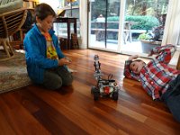 DSC01704  Enjoying some robot time - this thing can crack nuts, OR your TOES!