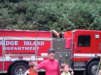 20141020 141901  Then...the power randomly went out with a big bang! So we were playing outside with neighbor boys when the fire dept went by to fix the power outage. So...we of course had to run down and watch. But I still had a mustache on.