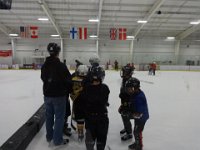 DSC01881  Getting a briefing from Coach Pike before the play starts.