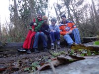DSC01819  Their favorite time of all. Family photo shoot. I use the same log every year. It's getting slipperier (is that a word?).