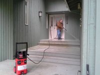 20150407 095437  Richard power washing the deck!