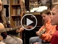 20150413 185644  Lessons with Randy...boys learning to play together!