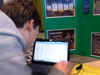 20150423 183700  Sam working on a bug at the crowded science fair!