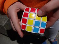 DSC02023  Sam is constantly solving, the whole trip. Multiple cubes. He's back in a cube phase!