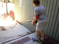 20150609 145133  A little cleanup after the gutters were blown out...