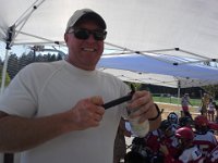 20150701 170556  Ken Fox is a really helpful parent on our team. Except...he's a bit too exuberant with the air horn which sounds off at the end of each period. He pumps it up to ensure he can really sound it off each time!