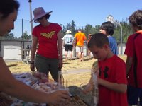 20150703 154022  Now he's buying up some sweets at the bake sale :) Kumkiko (on left taking money) and I worked the sale table. She did a great job organizing it. I got dry ice and parents donated soda and ice cream so we could make floats! Those were a big hit!