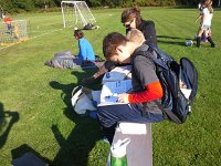 20151001 161328  Sam doing homework at soccer...he's getting very good at juggling multiple responsibilities and staying on top of 6th grade work.