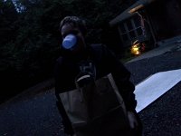 20151017 182054  Sam helping unload groceries...with a milk cup in his nose!