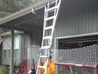 20151019 174937  Sam helping me get some pucks off the roof.