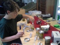 20160710 100659  Bottling my crazy tinctures - cedar shavings, fir tips, pine nuts, and anything I found while out hiking that smelled good we put in Everclear and Bourbon in September. Time to make some nice masculine scents! The kids had a great time spritzing everyone and everything. Some actually do smell good :)