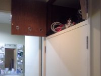 20160825 114809  Our room - where I am storing hockey gear for now. I love these closets. Very 1940s. Love it.