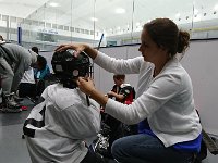 DSC 0325  This is the lower grades (1, 2, 3). Jake's mom helping him with his helmet. Jake and Tyler are Sam and Ben's age! So 4 crazy Americans are joining the club this fall. Jesse (Elizabeth's husband) coached red team for Squirts two years ago.