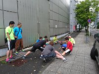 DSC 0346  Sam's team did about 5 laps around the block then stretched. As I jogged around with them, not understanding anything they were saying and having no idea how far we were going, it reminded me of jogging in Everett with the Squirts team. I had a clear memory of running behind Carver, Max, Eli and Zack as they laughed and jostled each other. Different language but same smiles and horsing around!