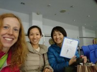 DSC 0351  My new friends Misaki and Minoko helping me figure out what a signal means! Red light OVER green arrow? HUH?
