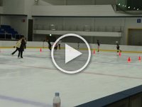 MOV 0161  Many figure skaters on the ice! Trying not to create an international incident. No sounds of hockey stopping out there, no sprayed "snow" on the boards...