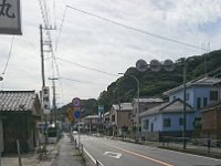 DSC 0556  Looking down the road. This is when you see Family Mart and are grateful for the sign which promises a cold drink, refilling your SUICA card, an ATM...