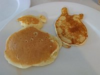 DSC 0587  Making pancakes before hockey practice which is at noon this time, so an early departure. These looked like Pokemon characters.